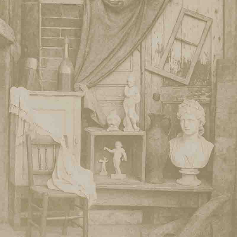 Still Lfe featuring a chair, a statue, and a window, creating a serene and artistic atmosphere.